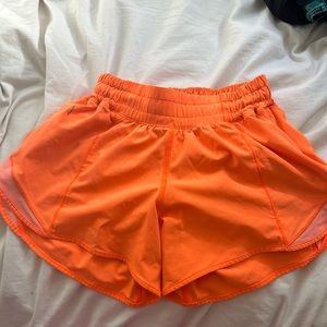 Neon Orange Lululemon Shorts size 2, 4in.